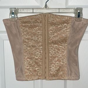 Pretty Nude corset. Size Medium. good condition. never worn.